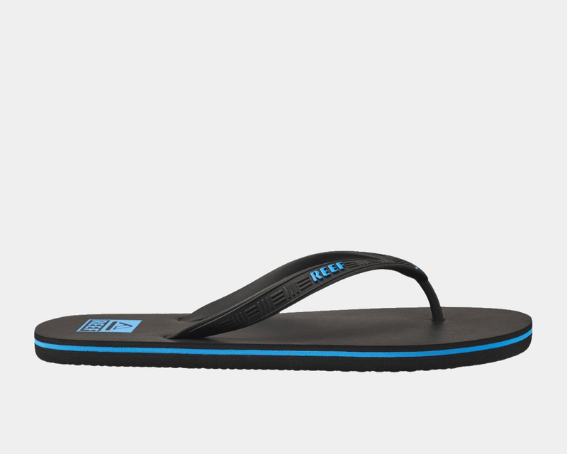 Reef Seaside sandals in black with blue accents and textured footbed, side view.