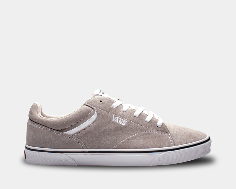 Vans Seldan skate shoes in light gray suede with white laces, white side stripe, and rubber outsole, side view.