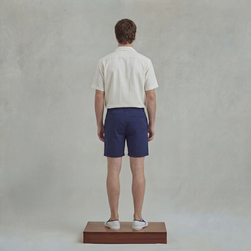 Short de bain court avec poche passepoilée