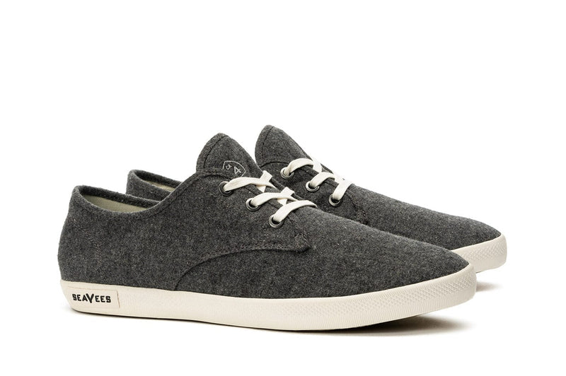 SeaVees Sixty Six sneakers in dark gray with a felt upper, white laces, and textured rubber outsole, side angle view.