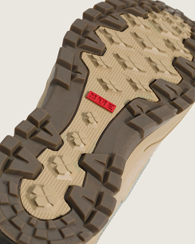 Vans Sk8-Hi GORE-TEX Insulated Shoe sole in tan and brown with rugged tread pattern and red MTE logo, bottom view.