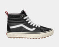 Vans Sk8-Hi MTE-1 high-top sneakers in black suede and canvas with white stripe detailing, gum outsole, and red heel tab, side view.