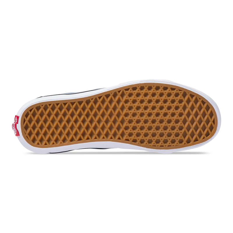 Vans Sk8-Hi sneakers outsole with waffle tread pattern in gum rubber and white midsole, bottom view.