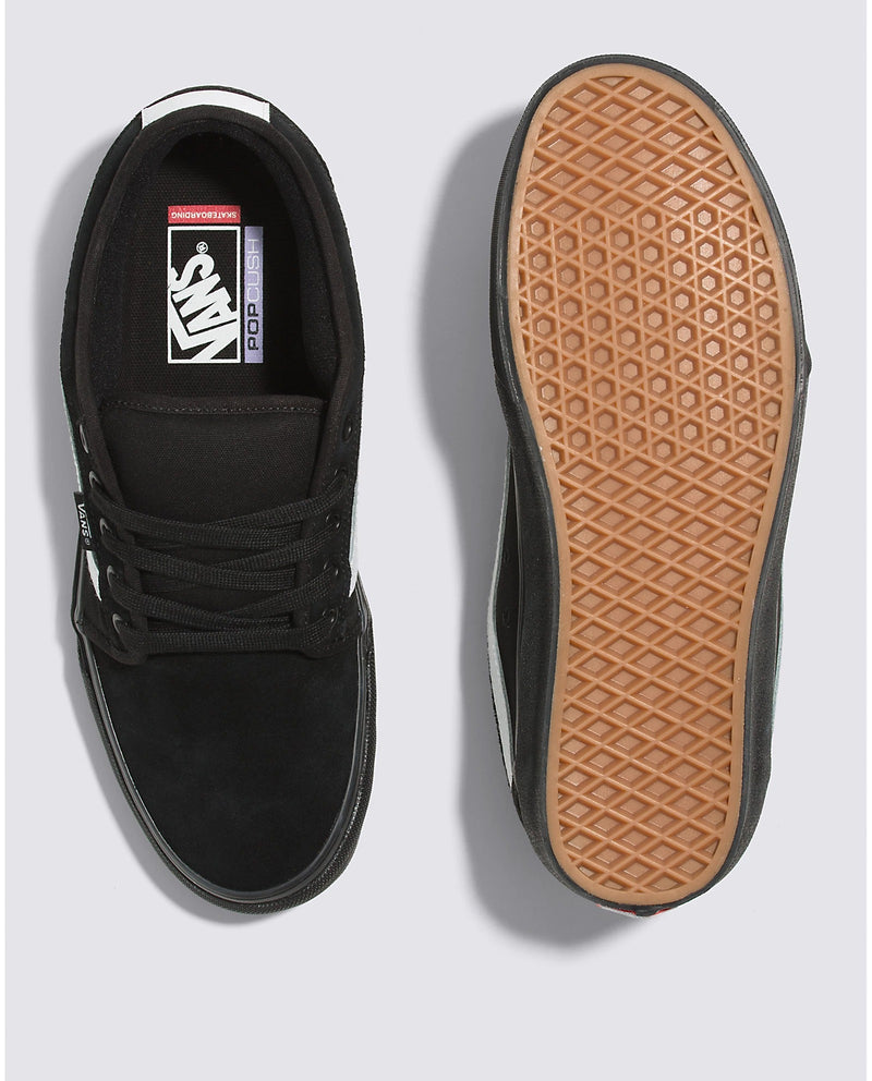 Vans Skate Chukka Low Sidestripe Core skate shoes in black with white sidestripe, gum waffle sole, top and outsole view.