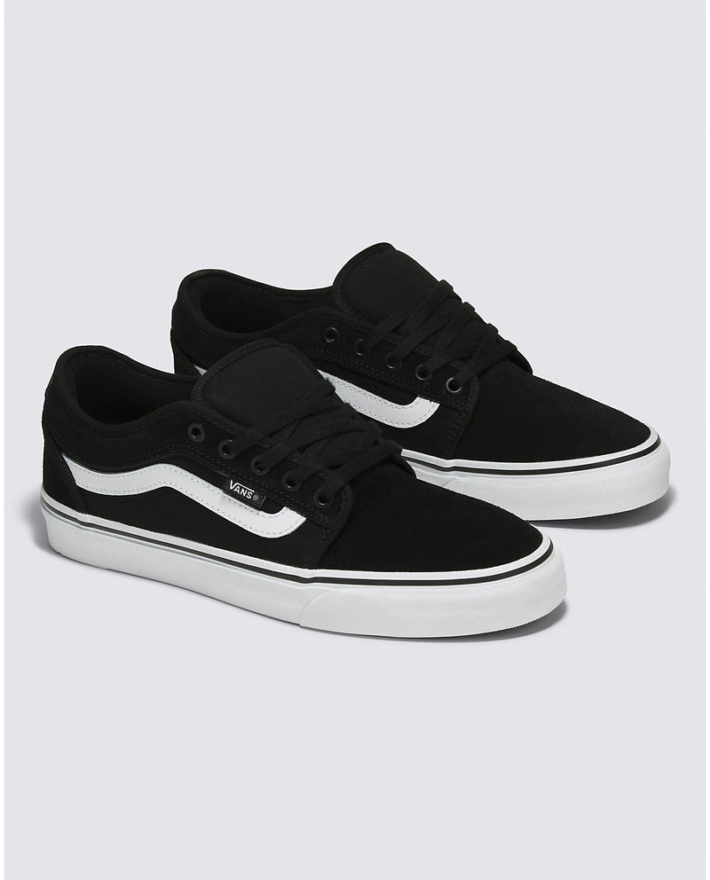 Vans Skate Chukka Low Sidestripe Core skate shoes in black suede with white sidestripe and vulcanized sole, angled view.