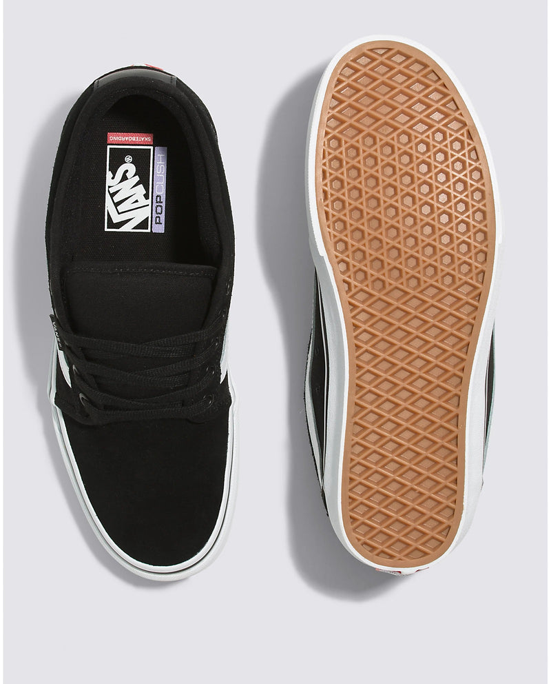 Vans Skate Chukka Low Sidestripe Core skate shoes in black and white with suede upper, leather sidestripe, and gum waffle outsole, top and sole views.