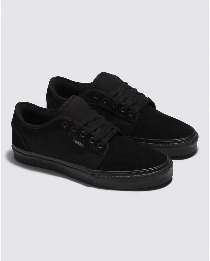 Vans Skate Chukka Low skate shoes in all-black suede and canvas upper with black rubber outsole, side view.