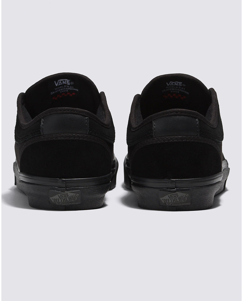 Vans Skate Chukka Low skate shoes in black suede with black outsoles and "Off The Wall" logo detail, back view.