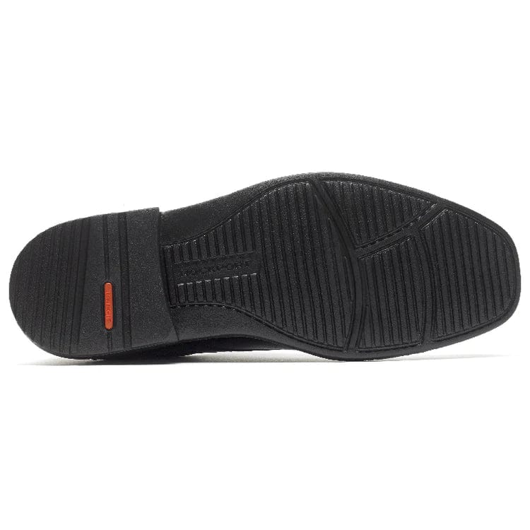 Rockport Style Leader 2 Bike Toe Oxford dress shoe outsole, black rubber with textured grip and orange accent.