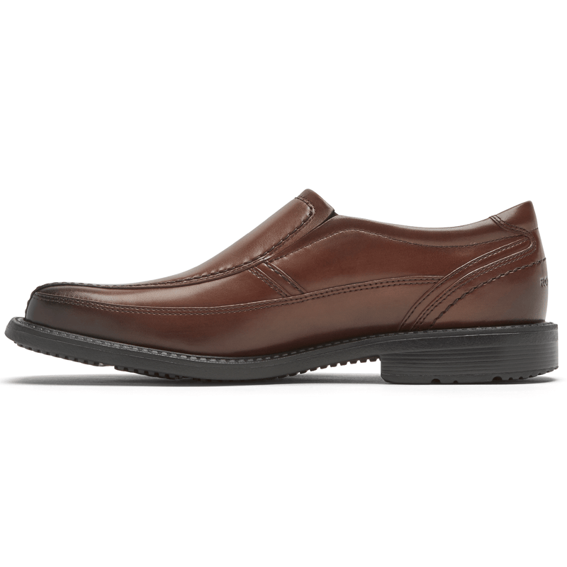 Rockport Style Leader 2 Bike Toe Slip-On dress shoes in brown leather with stitched detailing and slip-on design, side view.