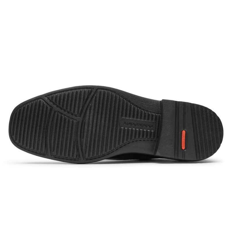 Rockport Style Leader 2 Plain Toe dress shoe outsole with textured black rubber and flex grooves for improved grip and durability.