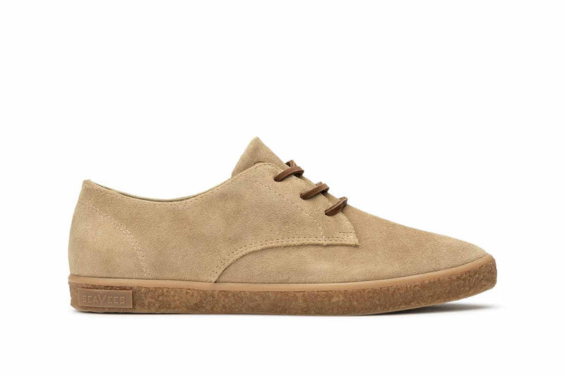 SeaVees Sun-Tans Buck shoes in tan suede with a minimalist design, brown laces, and a cork-inspired rubber sole, side view.