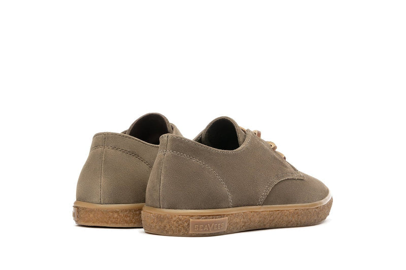 SeaVees Sun-Tans Buck shoes in taupe suede with gum rubber outsole, back angle showcasing heel and stitching details.