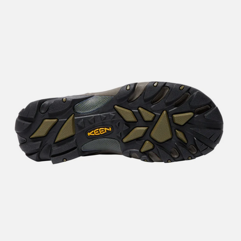 Keen Targhee II Mid hiking boot outsole with rugged tread pattern and green accents, bottom view.