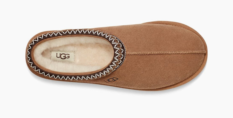 UGG Tasman Slipper in chestnut brown with embroidered trim and plush shearling lining, top view.