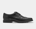 Rockport Taylor Waterproof Wingtip dress shoes in black leather with brogue detailing and polished finish, side view.
