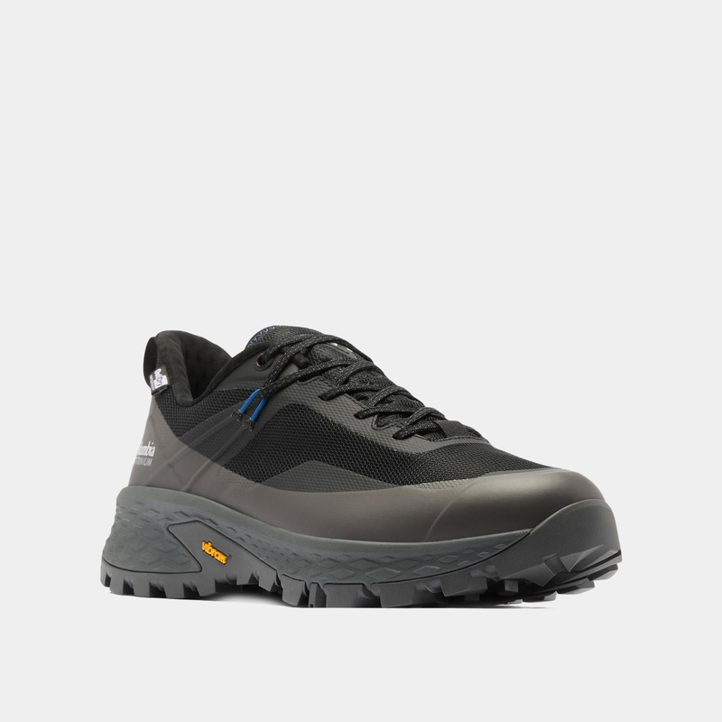 Columbia Tellurix Titanium OutDry shoes in black with waterproof upper, Vibram outsole, and rugged design, angled front view.