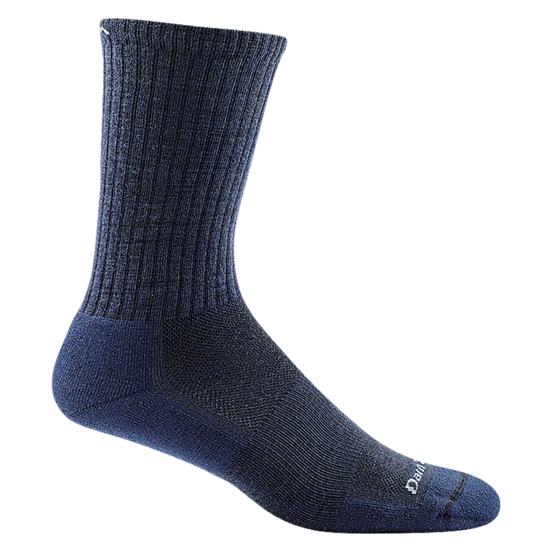 Darn Tough The Standard Crew Light Cushion socks in navy blue with ribbed leg and cushioned footbed, side view.