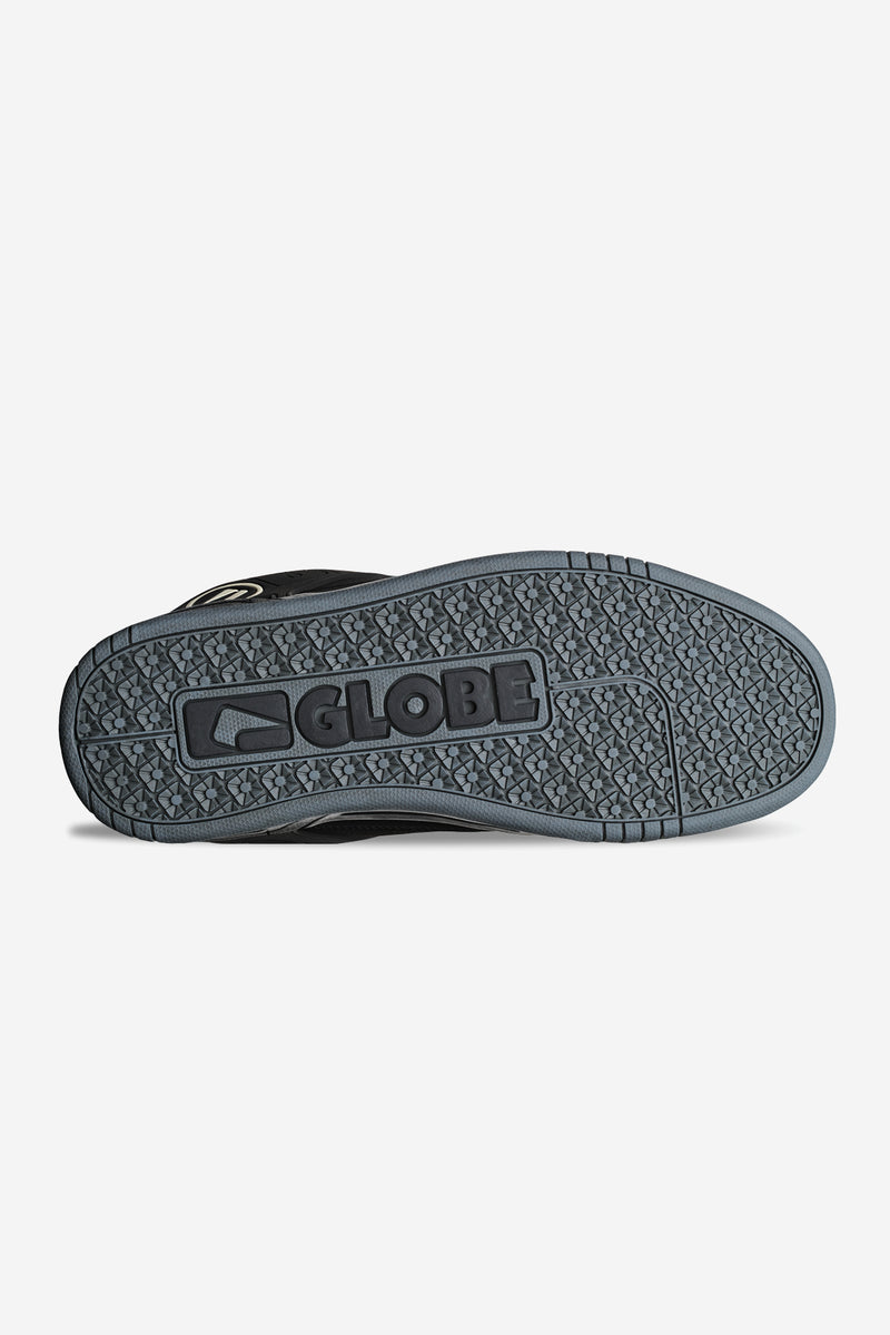Bottom view of the Tilt shoe showing the patterned outsole and Globe logo.