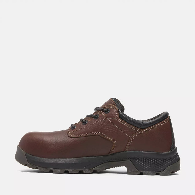 Timberland Pro TiTAN EV Composite Toe Oxford shoes in brown leather with black accents, slip-resistant outsole, side view.
