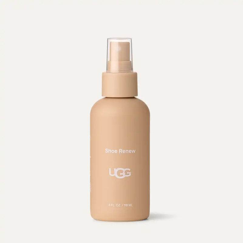 UGG Care Kit Shoe Renew spray in beige bottle with clear cap, 4 fl. oz. for cleaning and refreshing shoes, front view.