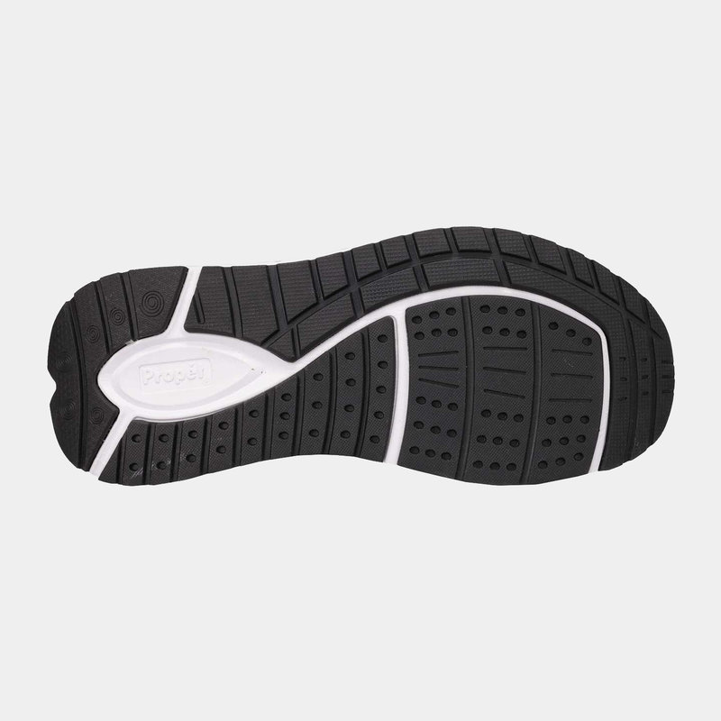 Propét Ultra 267 shoe outsole with black rubber, white accents, and textured tread pattern for grip and durability.