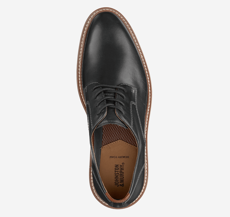 Johnston & Murphy Upton Plain Toe dress shoe in black leather with tan memory foam insole and brown stitched welt, top view.