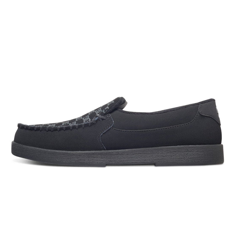 DC Footwear Villain 2 slip-on shoes in black with moc toe stitching and printed vamp detail, side view.