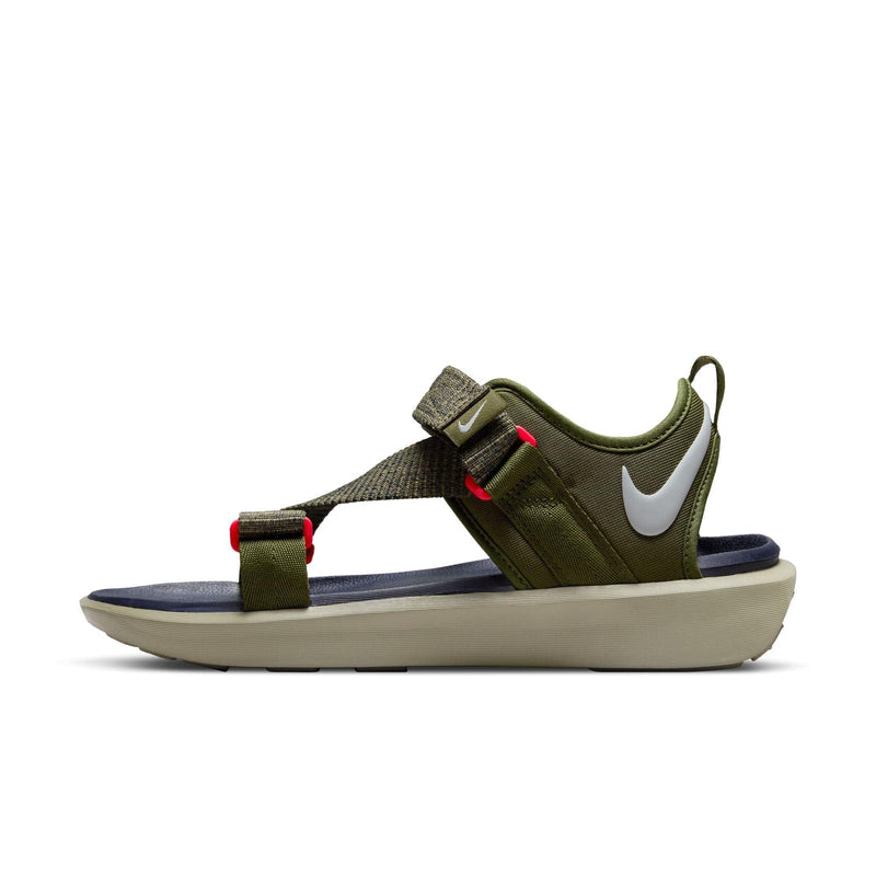 Nike Vista sandals in olive green with adjustable straps, white Nike logo, red accents, and cushioned beige sole, side view.