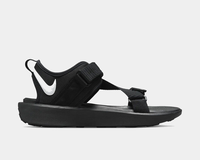 Nike Vista sandals in black with adjustable strap design and white Nike logo, side view.