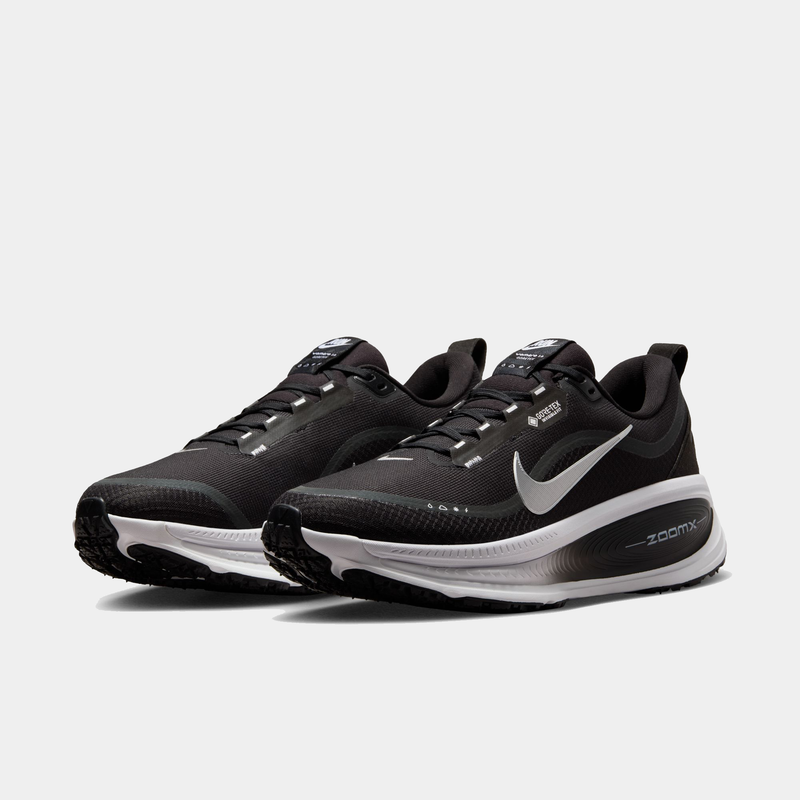 Nike Vomero 18 GORE-TEX running shoes in black with water-resistant GORE-TEX upper and ZoomX cushioning, front angled view.