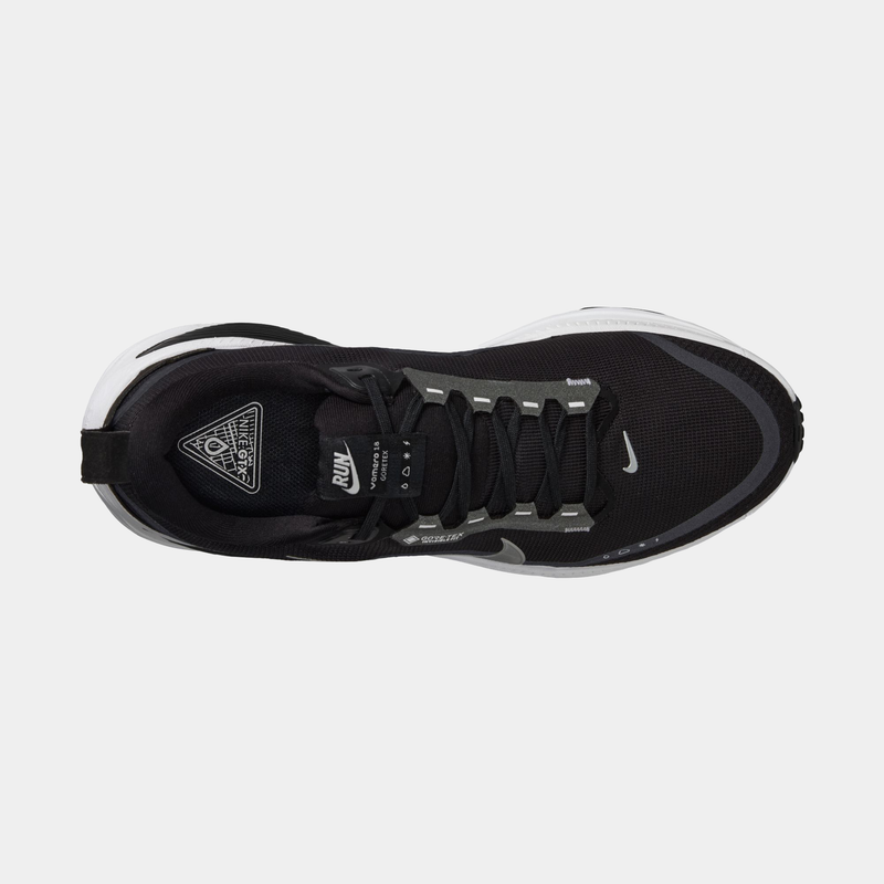 Nike Vomero 18 GORE-TEX running shoes in black with waterproof mesh upper and secure lace system, top view.