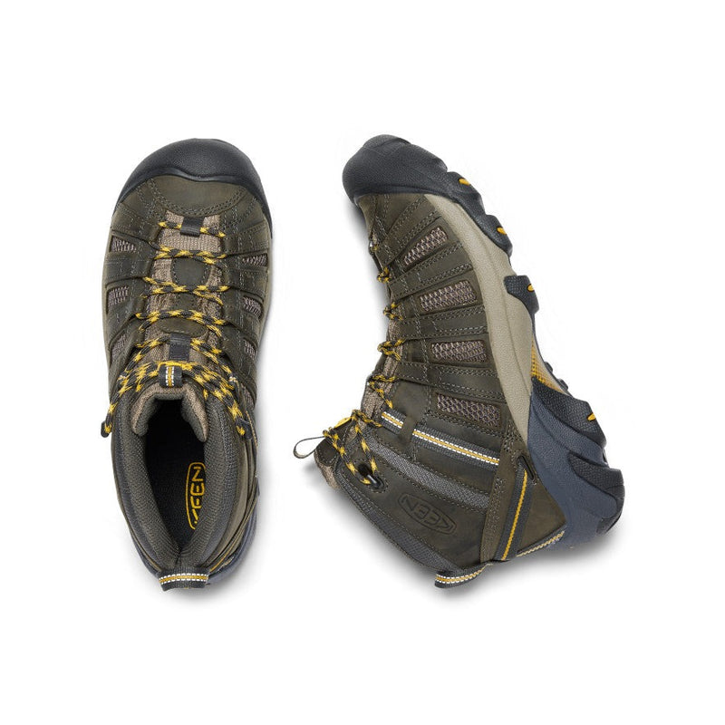 Keen Voyageur Mid hiking boots in olive green and tan with breathable mesh panels and yellow-accented laces, top view.