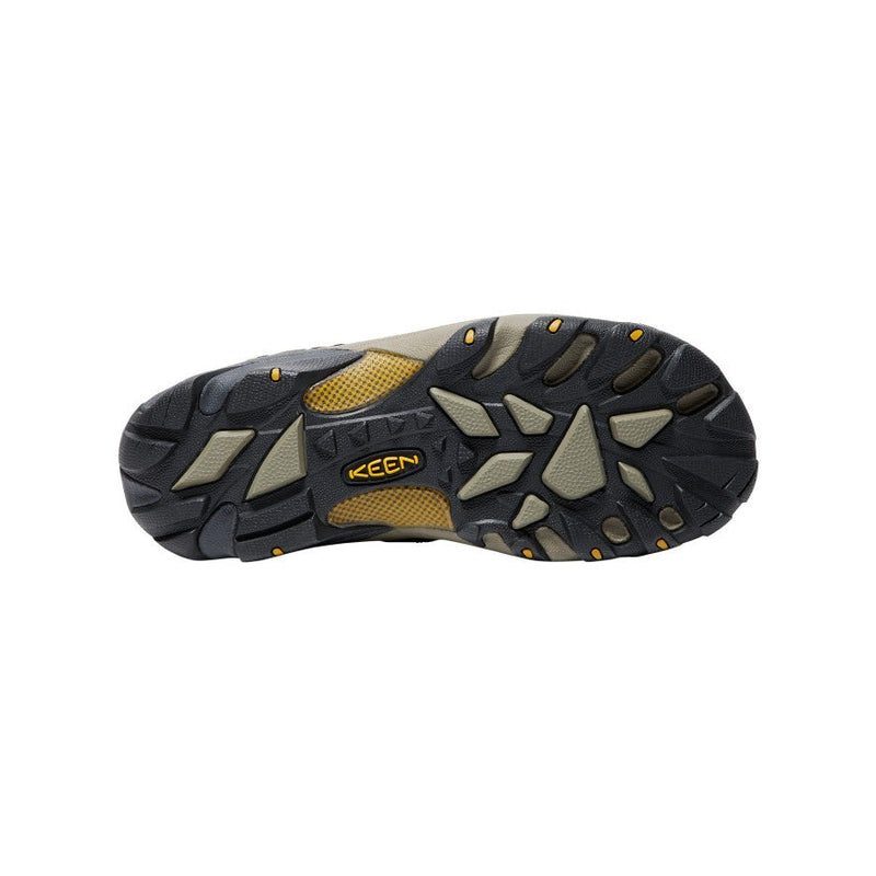 Keen Voyageur Mid hiking boots outsole with multi-directional lugs in black and beige rubber for enhanced traction.