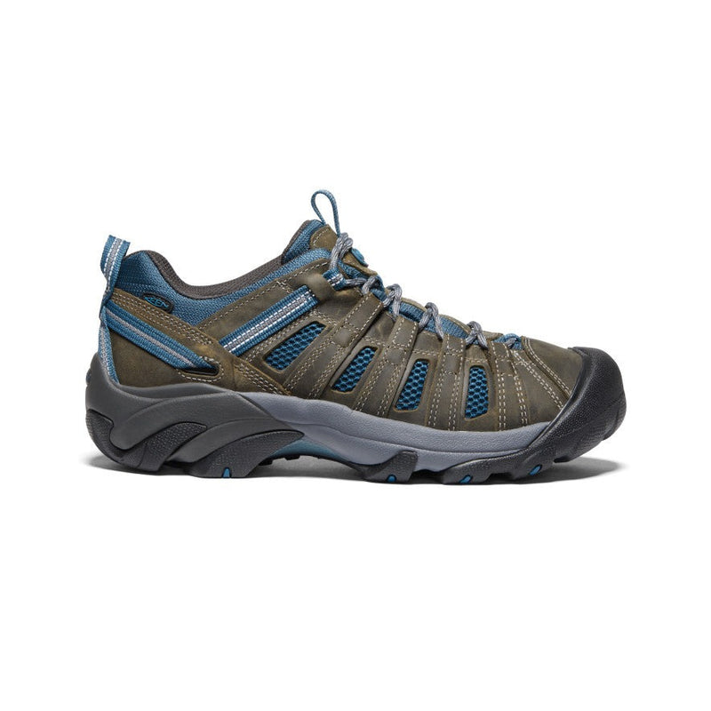 Keen Voyageur hiking shoes in brown with blue mesh panels, durable leather upper, and rugged outsole, side view.