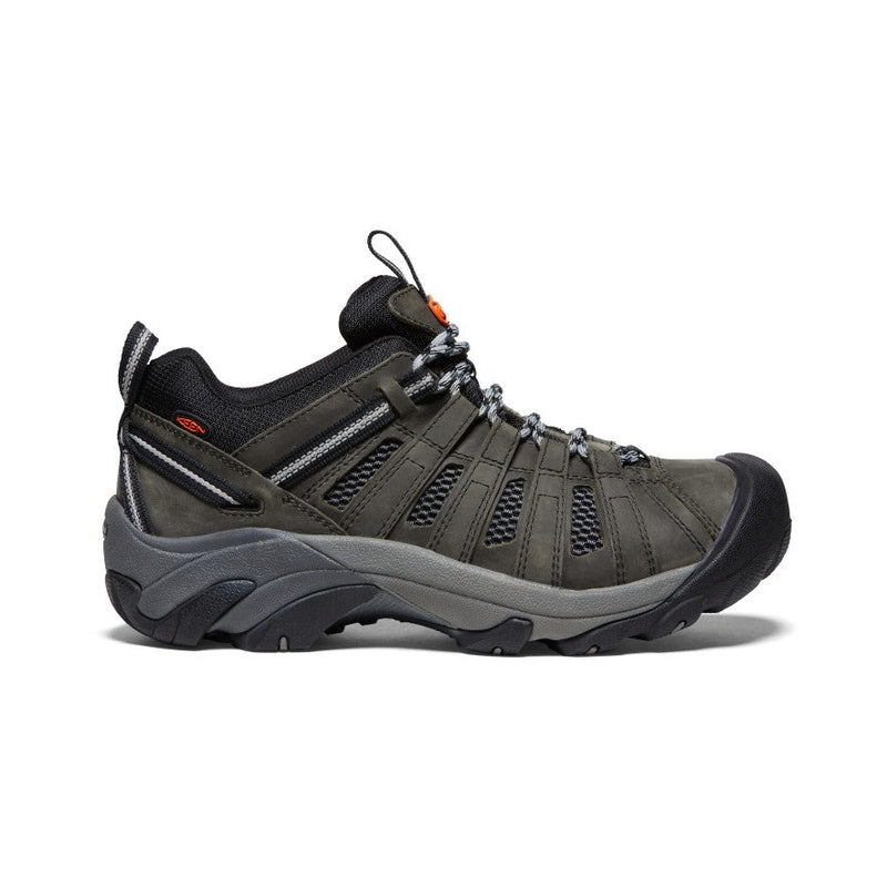 Keen Voyageur hiking shoes in dark gray with breathable mesh panels, durable leather overlays, and rugged sole, side view.