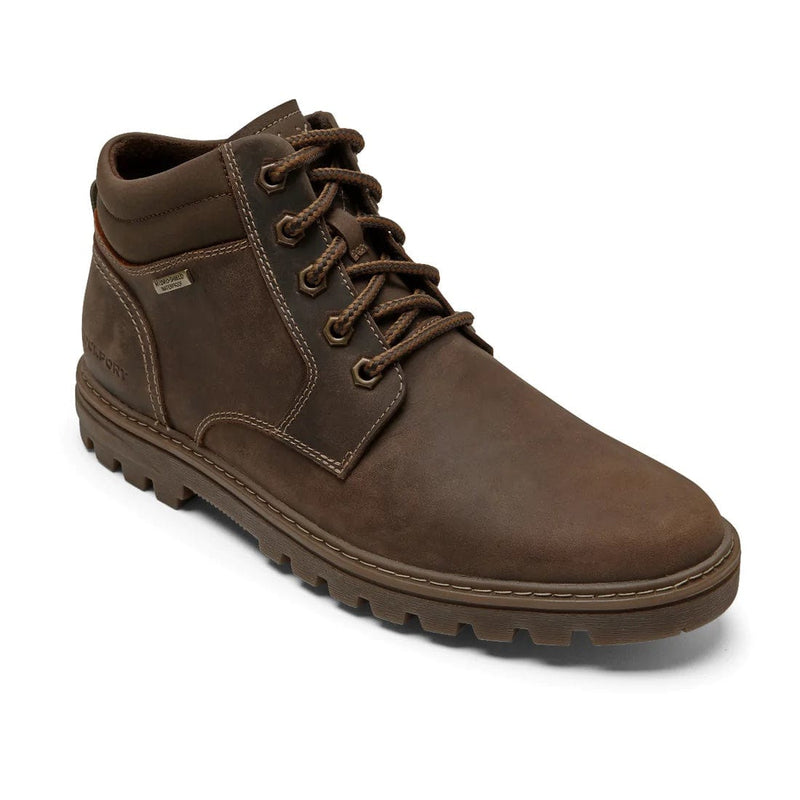 Rockport Weather or Not Waterproof Boot in brown leather with rugged outsole and padded collar, front angled view.