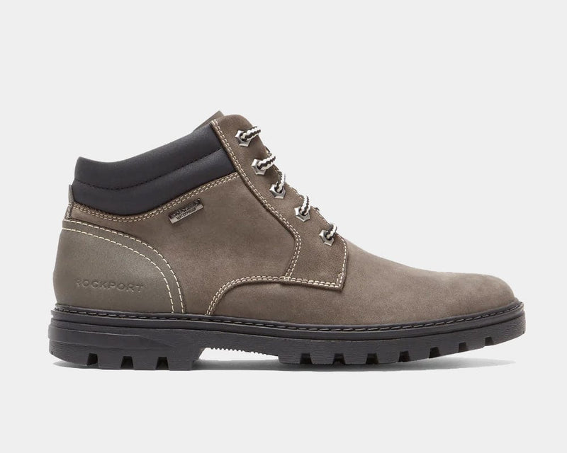 Rockport Weather or Not Waterproof Boot in taupe suede with black padded collar and rugged outsole, side view.