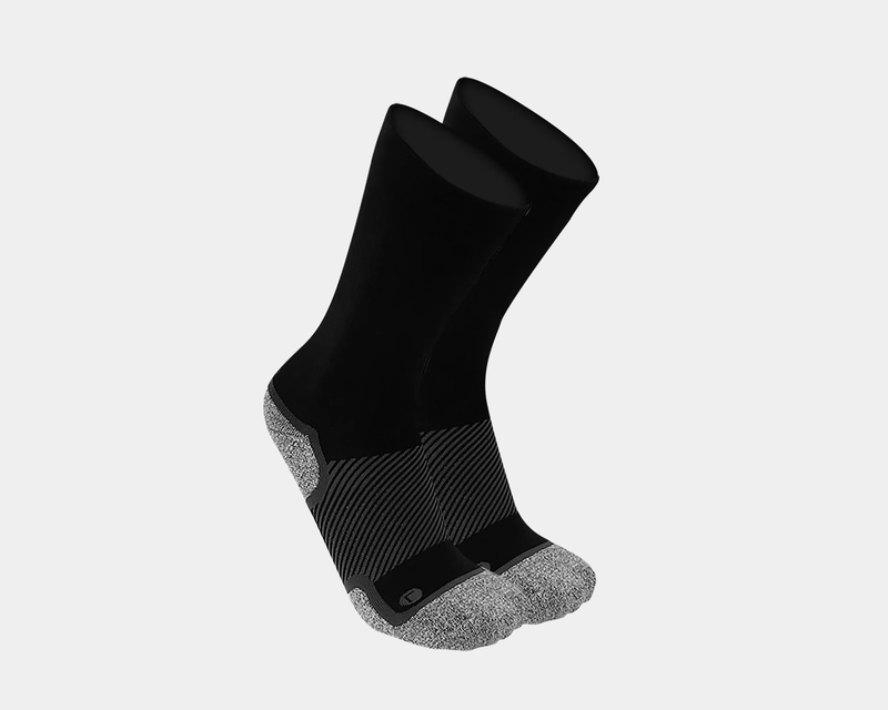 OS1st Wellness Performance Crew Socks in black and gray with supportive compression and cushioned toe and heel, angled view.