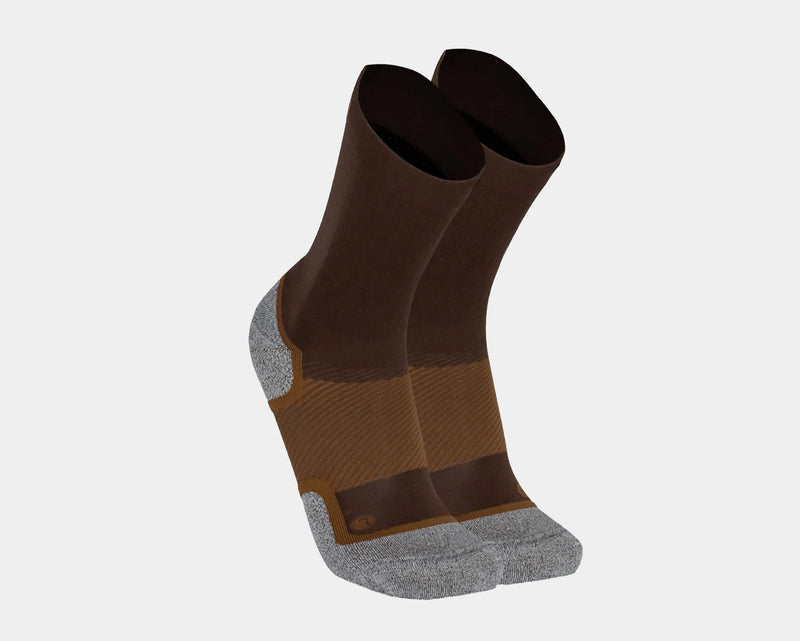 OS1st Wellness Performance Crew Socks in brown with cushioned gray toe and heel, arch support, and breathable fabric, angled view.