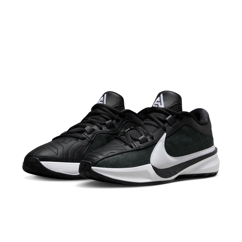 Nike Zoom Freak 5 basketball shoes in black with white accents, featuring a large swoosh logo and textured details, front angle view.