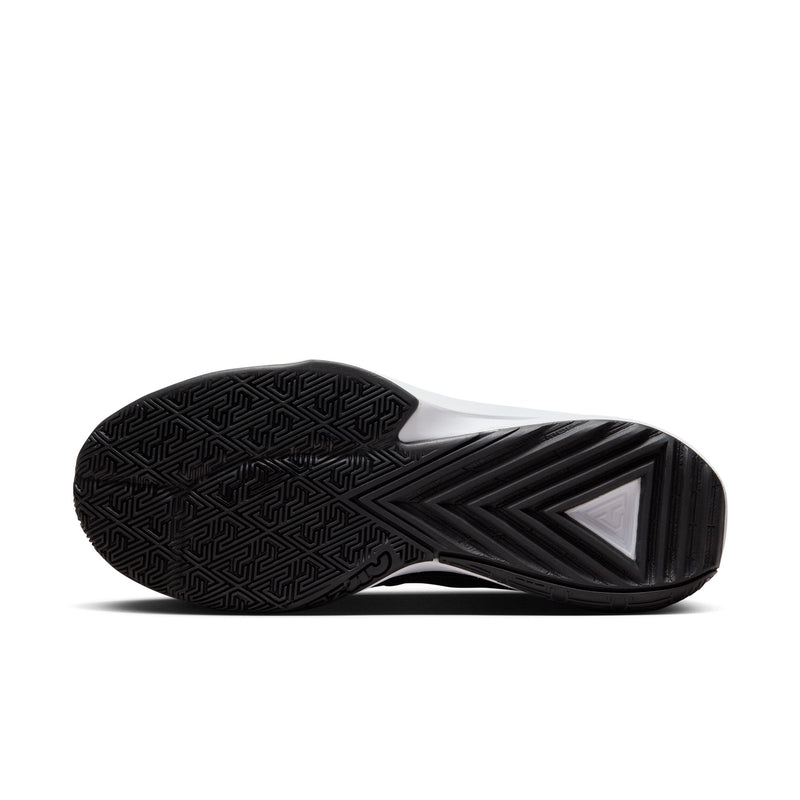 Nike Zoom Freak 5 basketball shoes, black rubber outsole with multidirectional traction pattern, sole/bottom view.